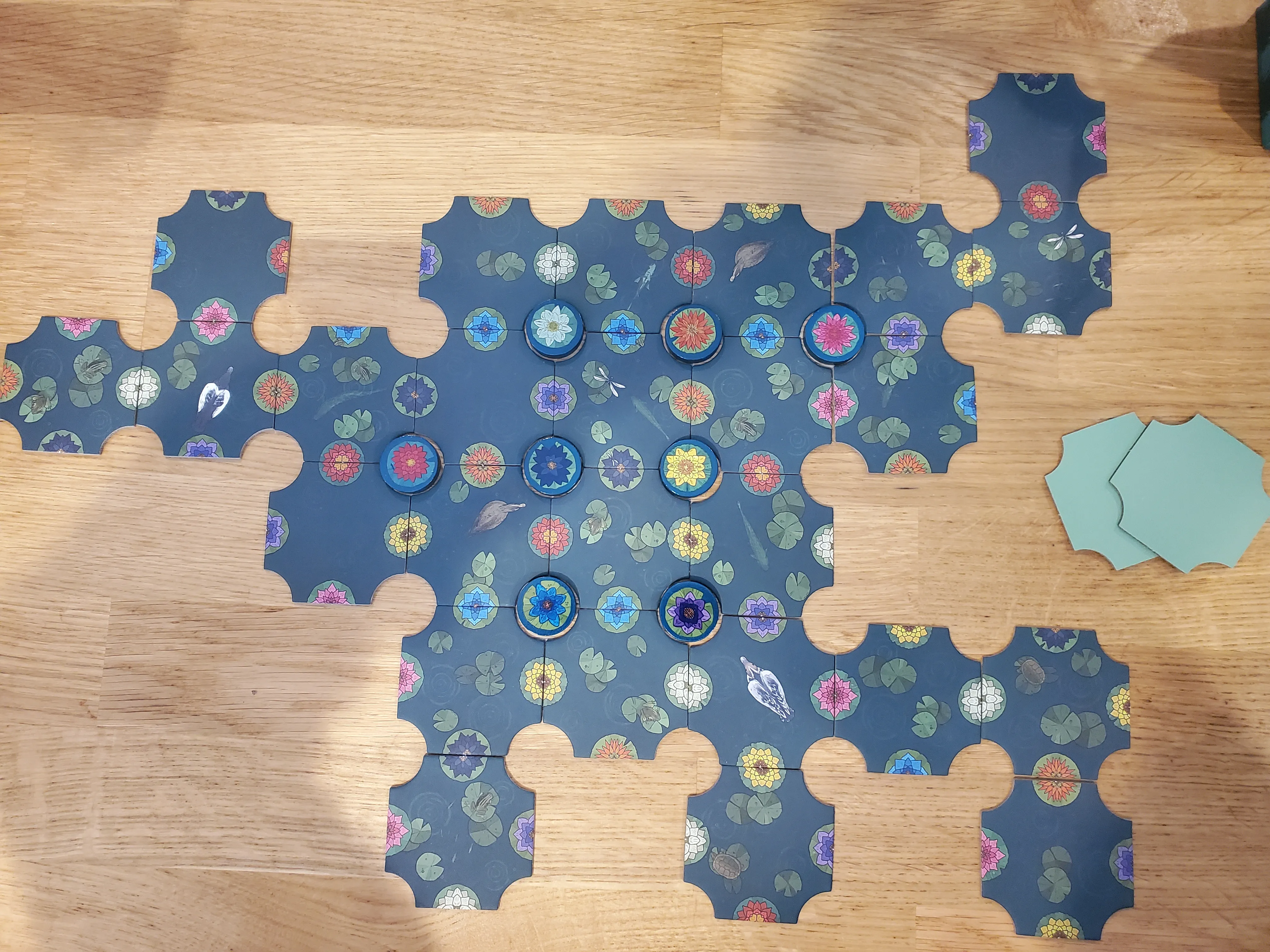 A Gentle Rain tiles on a wood background